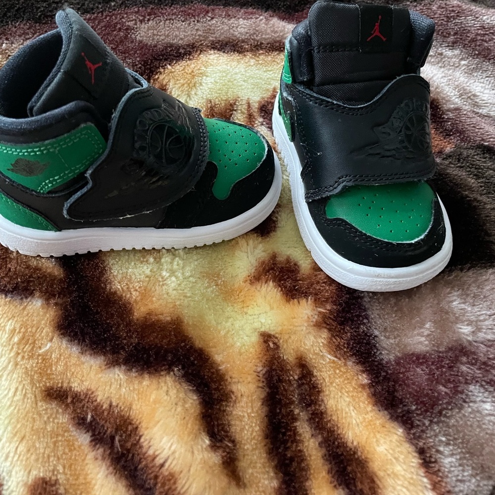 Green and black jordans